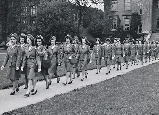 cadet nurses walking through quad