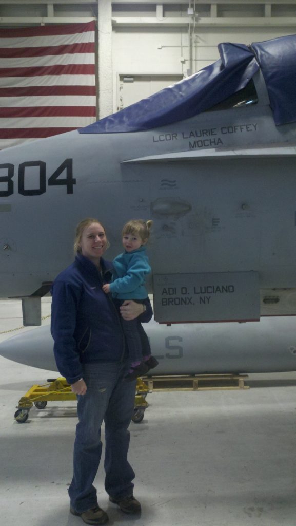 Coffey holding her daughter