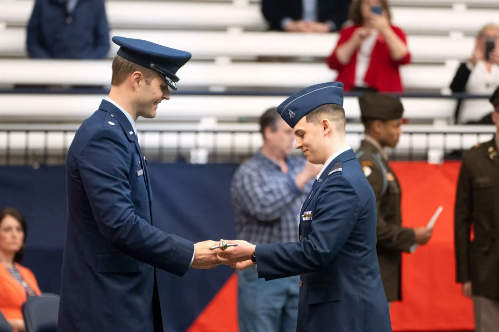 Ben johnson recieving award during chancellor's review