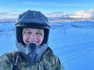 Alexa Hernandez smiling in helmet.