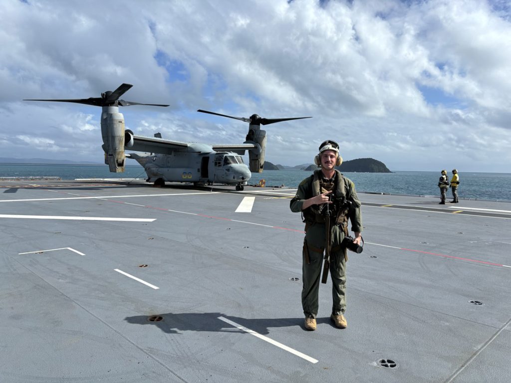 Cristian Bestul near an osprey.