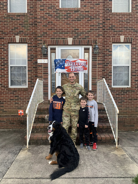 Joseph Raffa with his children and dog.