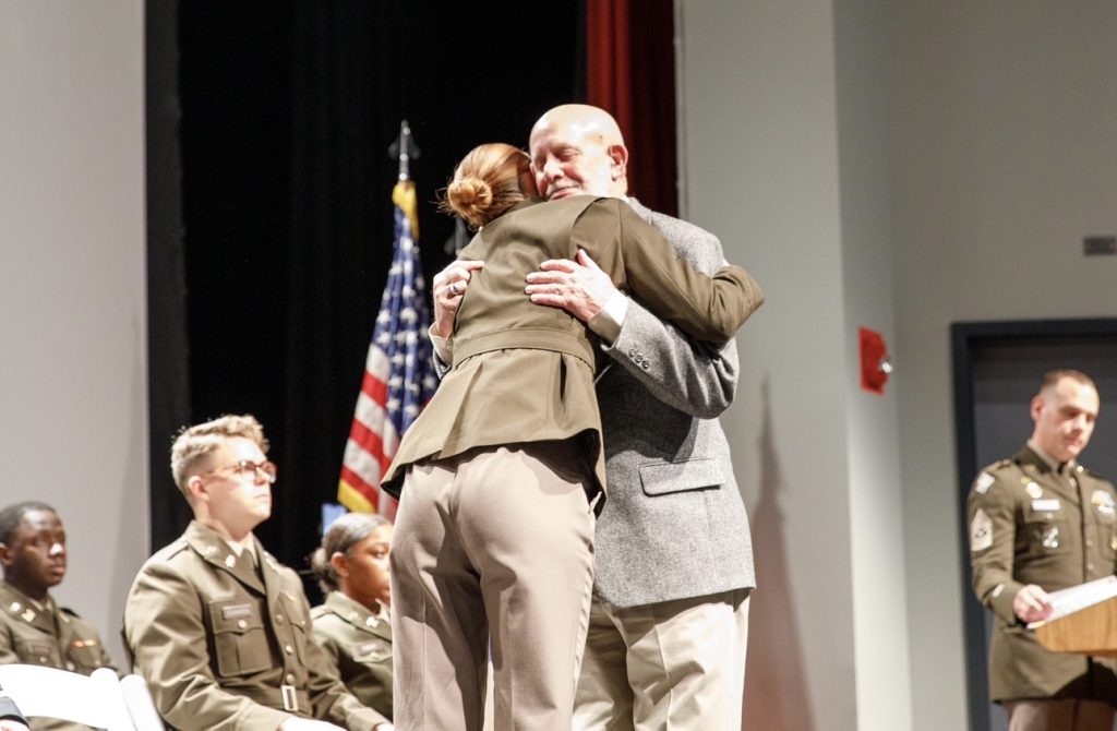 United States Army Second Lieutenant Katherine “Kat” Whitson was born in Augusta, Georgia and was raised in Grovetown, Georgia. Kat enrolled at the Georgia Military College in 2022, where she earned two associate degrees while participating in numerous extracurricular activities. Her dedication to academic excellence and service culminated in being named a Distinguished Graduate, graduating summa cum laude at the top of her class. A member of the Army’s Early Commissioning Program (ECP), Kat was commissioned as a Second Lieutenant in 2024. In August 2024, 2LT Whitson enrolled at Syracuse University to begin the completion of her bachelor’s degree in sociology. While balancing a rigorous academic course load, Kat has maintained a strong academic performance and earned a place on the Dean’s list. In February 2025, 2LT Whitson married her husband Braden, a fellow Army 2LT whom she met while attending Georgia Military College. 2LT Whitson currently serves in Headquarters and Headquarters Company of the 27th Infantry Brigade Combat Team in the Communications section. In this role she supports critical communication operations across the Brigade and ensures systems remain operational and contribute to mission success. The proudest moment of her military career was commissioning as an officer, a milestone that represents both personal growth and commitment to leading and serving others. Across her academic, professional, and military experiences, 2LT Whitson continues to demonstrate dedication, adaptability, and a strong sense of responsibility toward both community and our nation.