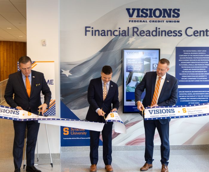Visions federal credit union ribbon cutting with Ron Novack, Deputy Director of the Office of Veteran and Military Affairs, Tim STrong, Asst. VP of Branding & Community Impact with Visions FCU, and Dr. Michael Haynie, Executive Director of the D’Aniello Institute for Veterans and Military Families
