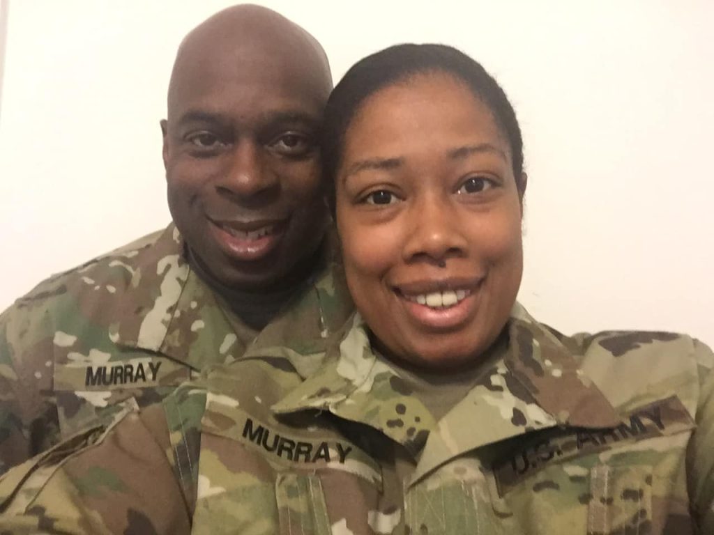 Allison and dwayne murray in uniform together.