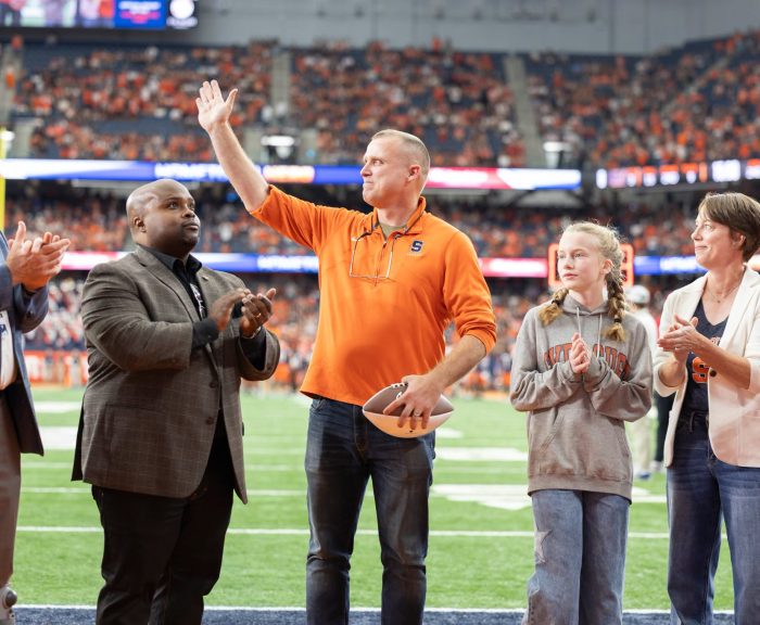 AJ as hometown hero with his family on the Dome field.
